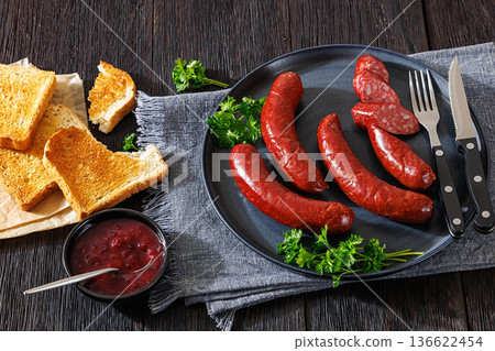 Smoked Swedish isterband sausages on a plate 136622454