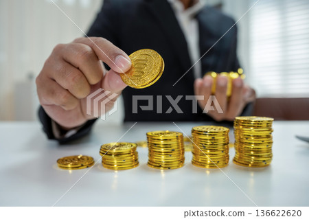 Accounting Financial and tax systems concept. Businessman are calculating income-expenditure and analyzing real estate investment data at office. 136622620