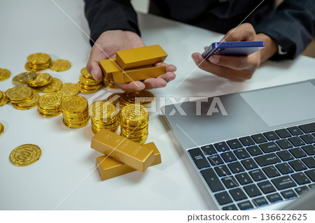 Accounting Financial and tax systems concept. Businessman are calculating income-expenditure and analyzing real estate investment data at office. Accounting Financial and tax systems concept. Businessman are calculating income-expenditure and analyzing real estate investment data at office. 136622625