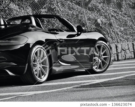 shiny black open car shiny black open car 136623074