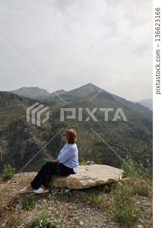 Woman mountain landscape. High quality photo Woman mountain landscape. High quality photo 136623166