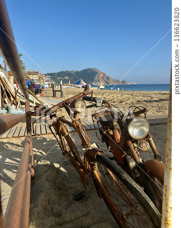 Rusty beach motorcycle. High quality photo Rusty beach motorcycle. High quality photo 136623820