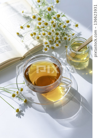 Tea time with beautiful sunshine and shade, Earl Grey tea and honey, Matricaria 136623931
