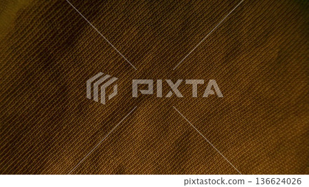 rich brown corduroy fabric closeup revealing diagonal ribbed texture and warm earthy tones perfect for autumn wallpaper or fashion editorial background rich brown corduroy fabric closeup revealing diagonal ribbed texture and warm earthy tones perfect for autumn wallpaper or fashion editorial background 136624026