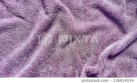 vibrant purple plush fabric texture undulating softly in macro closeup evoking cozy luxury ideal for soothing wallpaper or elegant banner background vibrant purple plush fabric texture undulating softly in macro closeup evoking cozy luxury ideal for soothing wallpaper or elegant banner background 136624034