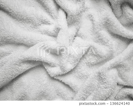 soft white fluffy towel texture closeup rippling with serene folds ideal spa banner background or clean wallpaper design soft white fluffy towel texture closeup rippling with serene folds ideal spa banner background or clean wallpaper design 136624140