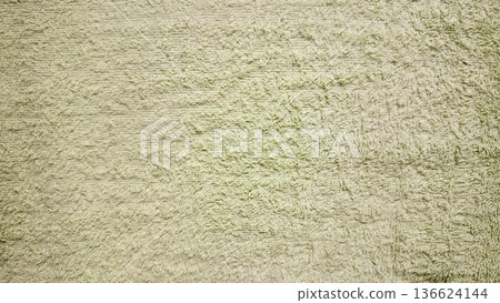 soft pale green fluffy towel texture closeup plush loops ripple inviting serene spa serenity background wallpaper with copy space 136624144