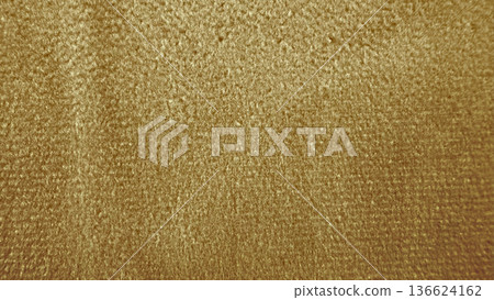 opulent golden velvet texture shimmering with fuzzy fibers in warm glow ideal for luxury wallpaper or elegant banner background opulent golden velvet texture shimmering with fuzzy fibers in warm glow ideal for luxury wallpaper or elegant banner background 136624162