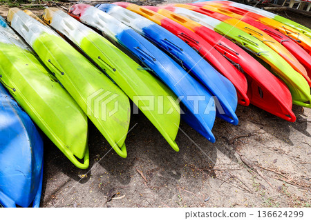Canoes lined up on the lake Canoes lined up on the lake 136624299