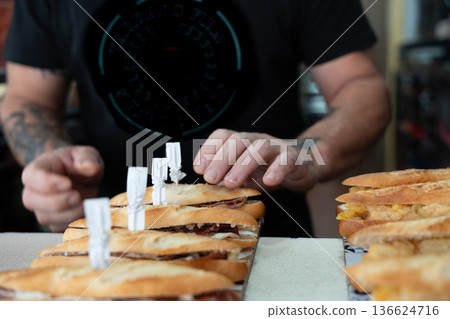 Chef preparing traditional spanish tapas pinchos Chef preparing traditional spanish tapas pinchos 136624716