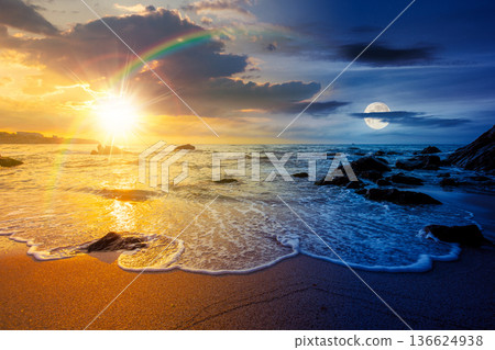 empty sandy beach at the sea. day and night time change concept. white foam rolling on to the shore near boulder with sun and moon at twilight. perfect summer vacation concept. astrology wallpaper empty sandy beach at the sea. day and night time change concept. white foam rolling on to the shore near boulder with sun and moon at twilight. perfect summer vacation concept. astrology wallpaper 136624938