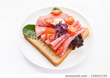 Vegetables and ham on bread 136625195