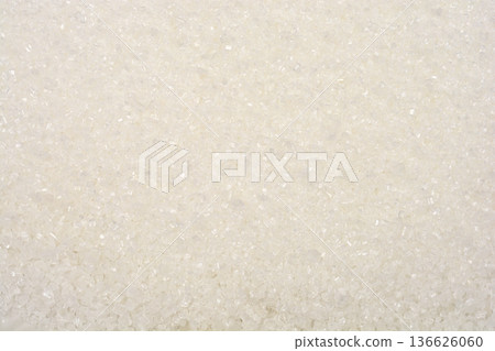 Macro texture of white granulated sugar crystals Macro texture of white granulated sugar crystals 136626060