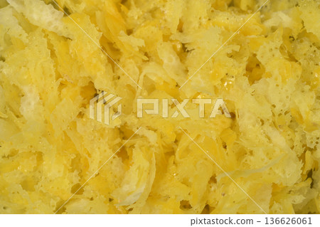 Close-up of fresh grated lemon zest 136626061