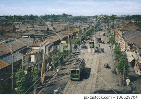 Old photo of Yasukuni Street in Jimbocho, Tokyo, 1918-1933 (black and white photo colorized using AI) 136629704