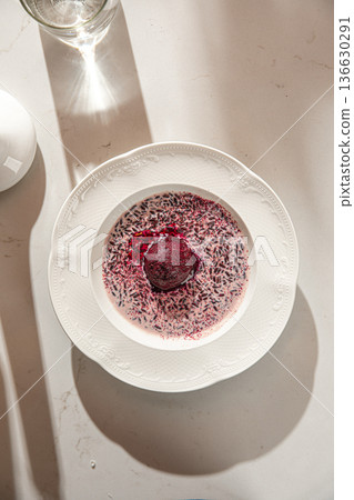 Wild rice porridge with berry sorbet 136630291