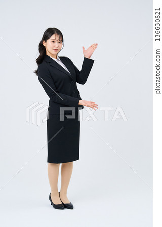 Business woman posing for guidance 136630821
