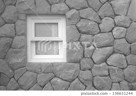 Beautiful stone walls modern windows decorate the exterior 136631244