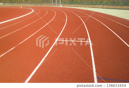 Red running track in stadium. Red running track in stadium. 136631654
