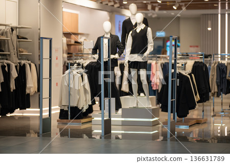 Modern clothing store interior with mannequins Modern clothing store interior with mannequins 136631789