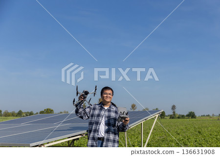 Modern Technologies in Agriculture. Farmer with drone on the farm field. Smart farming and precision agriculture. Modern Technologies in Agriculture. Farmer with drone on the farm field. Smart farming and precision agriculture. 136631908