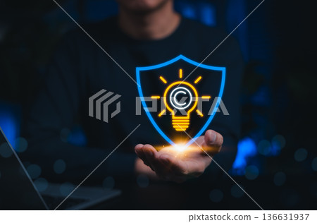 Intellectual property protection concept. Copyright icon inside lightbulb and shield. symbolizing legal services, copyright law, digital rights, innovation security and creative content protection. Intellectual property protection concept. Copyright icon inside lightbulb and shield. symbolizing legal services, copyright law, digital rights, innovation security and creative content protection. 136631937