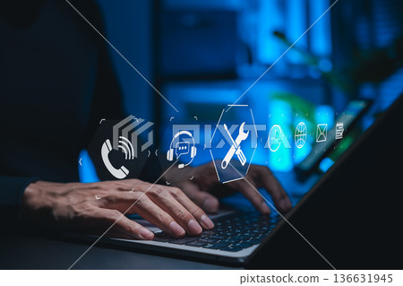Customer support and technical service concept. Person using laptop with icons of call, chat, tools, email, 24/7 assistance symbolizing online helpdesk, IT maintenance, professional service support 136631945