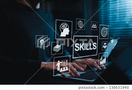 Skills development concept. Person using laptop with digital icons representing learning, training, knowledge, achievement, professional growth represent modern skill acquisition, personal development Skills development concept. Person using laptop with digital icons representing learning, training, knowledge, achievement, professional growth represent modern skill acquisition, personal development 136631948