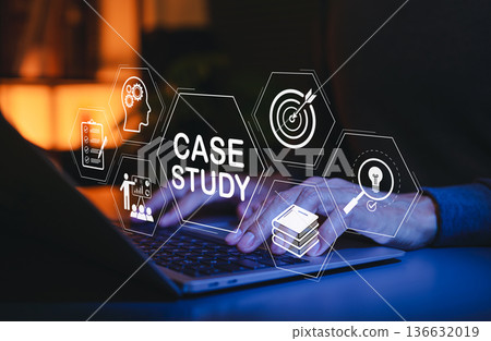 Case study concept. Businessman analyzing strategy and insight on laptop with icon of goals, research, innovation, performance metrics for education, business growth, learning in corporate development 136632019