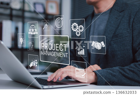 Project management technology concept. Businessman working on laptop with icons representing planning, task tracking, team collaboration, deadline, optimization, goal setting and workflow automation. 136632033