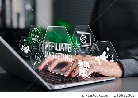 Affiliate marketing strategy concept. Person using laptop with icons showing online promotion, advertising, sales commission, tracking links, and digital content monetization on ecommerce platforms. Affiliate marketing strategy concept. Person using laptop with icons showing online promotion, advertising, sales commission, tracking links, and digital content monetization on ecommerce platforms. 136632062