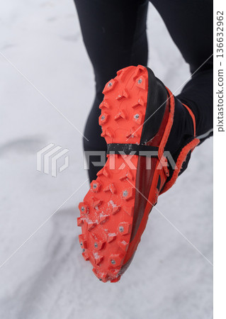 bright orange trail shoes with metal spikes bright orange trail shoes with metal spikes 136632962