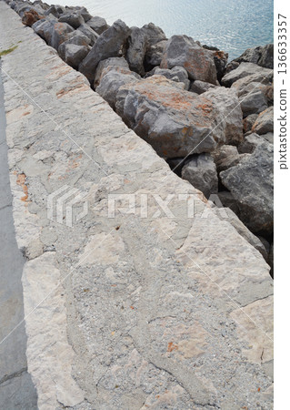 Stone Breakwater on the Coast by the Sea Stone Breakwater on the Coast by the Sea 136633357