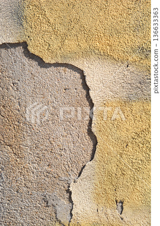 Peeling Yellow Plaster on Concrete Wall Peeling Yellow Plaster on Concrete Wall 136633363