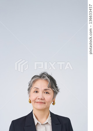 Senior woman in suits Senior woman in suits 136633457