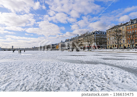 Frozen lake with people walking on ice. Copenhagen, Denmark Frozen lake with people walking on ice. Copenhagen, Denmark 136633475