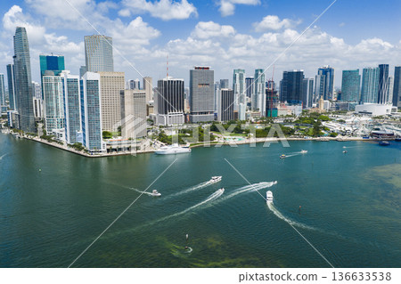 Aerial view of Brickell skyscrapers. Modern cityscape of downtown Miami. Panoramic Miamis skyline above the coastline. Brickell Key aerial view in Miami. Landscape of Miami. Miami Beach and Brickell. 136633538