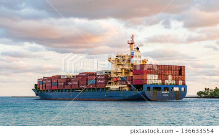 Miami, Florida, USA - November 25, 2024: Freight container on cargo vessel. Cargo ship vessel. Container ship. Cargo Annie B Monrovia ship services with container leaving port, drone view Miami, Florida, USA - November 25, 2024: Freight container on cargo vessel. Cargo ship vessel. Container ship. Cargo Annie B Monrovia ship services with container leaving port, drone view 136633554