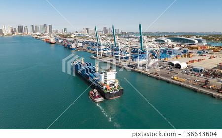 Miami, Florida, USA - March 20, 2025: Freight container on cargo vessel. Cargo ship vessel. Miami port. Container ship. Cargo Warnow Whale Limassol ship with container in Miami. Commercial vessel Miami, Florida, USA - March 20, 2025: Freight container on cargo vessel. Cargo ship vessel. Miami port. Container ship. Cargo Warnow Whale Limassol ship with container in Miami. Commercial vessel 136633604