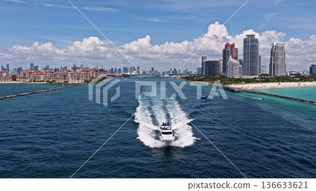 Miami Beach aerial drone view with skyline. Miami from above. Drone view of Miamis famous landmarks. South Pointe beach with skyscrapers. Miami city panorama. Oceanfront skyline of Miami Beach. Miami Beach aerial drone view with skyline. Miami from above. Drone view of Miamis famous landmarks. South Pointe beach with skyscrapers. Miami city panorama. Oceanfront skyline of Miami Beach. 136633621