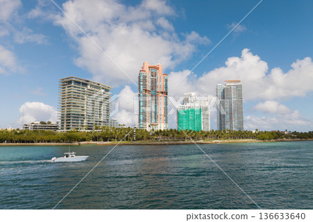 Yacht cruising near Miami Beach. Aerial view of boats on turquoise waters in Miami. Yacht retreat in South Florida Miami. Yacht cruising near Miami Beach. Aerial view of boats on turquoise waters in Miami. Yacht retreat in South Florida Miami. 136633640