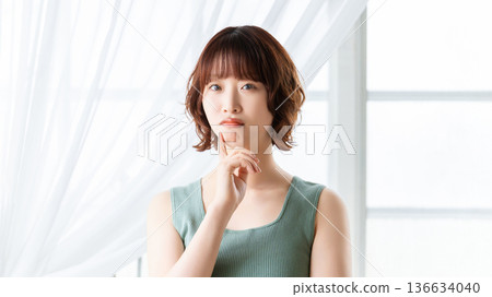 A woman thinking/beauty image A woman thinking/beauty image 136634040