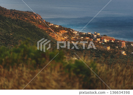 Scenic Golden Hour Landscape of Coastal Village Scenic Golden Hour Landscape of Coastal Village 136634398