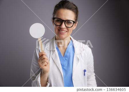 Eye Doctor Preparing for Vision Examination Eye Doctor Preparing for Vision Examination 136634605