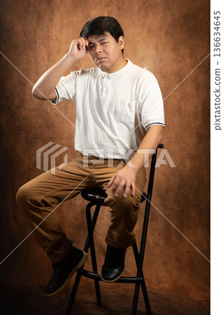Worried young man Worried young man 136634645