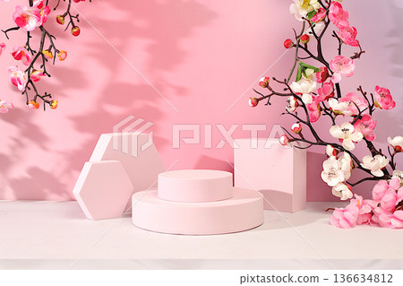 Beautiful spring stand and template for your creativity on a colorful background with pink sakura flowers for design, Abstract composition for displaying cosmetic products, Elegant beauty concept. Beautiful spring stand and template for your creativity on a colorful background with pink sakura flowers for design, Abstract composition for displaying cosmetic products, Elegant beauty concept. 136634812