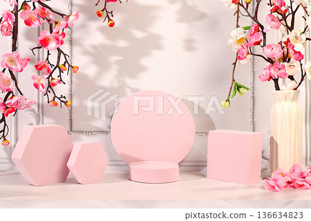 Abstract composition of empty geometric podiums for cosmetic products on a colorful background with pink sakura flowers for design, beautiful spring podium and template for your creativity, Abstract composition of empty geometric podiums for cosmetic products on a colorful background with pink sakura flowers for design, beautiful spring podium and template for your creativity, 136634823