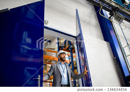 Senior industrial manager in modern factory. 136634856