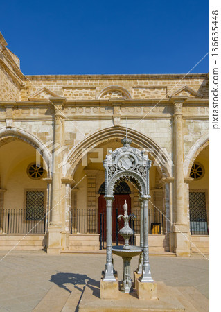 Ornate cast-iron memorial before Saint Joseph Maronite Church in Larnaca, Cyprus 136635448