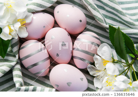 Pink easter eggs decorated with silver patterns Pink easter eggs decorated with silver patterns 136635646